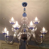Unique glass chandelier installed flush on ceiling of NYC apt.